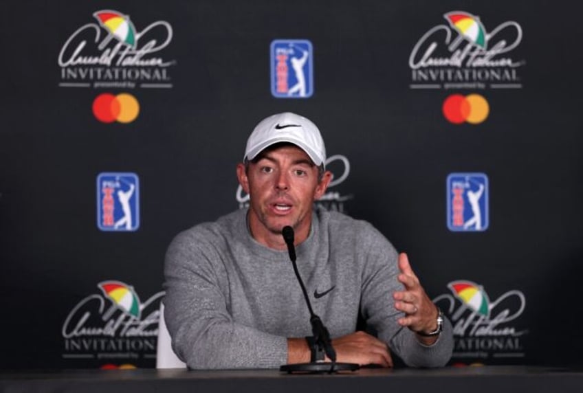 Rory McIlroy says a deal to unify golf's rival PGA Tour and LIV circuits does not feel any