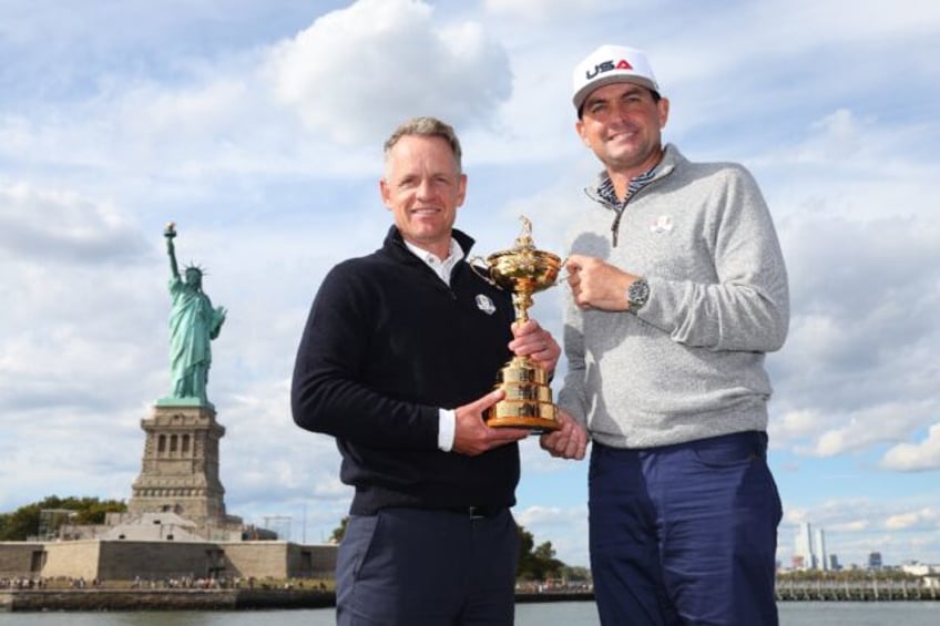 Europe team captain Luke Donald of England, left, and USA captain Keegan Bradley, right, h