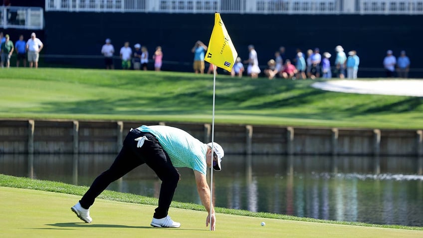 pga tour golfer ryan fox makes history after hole in one on island green at the players