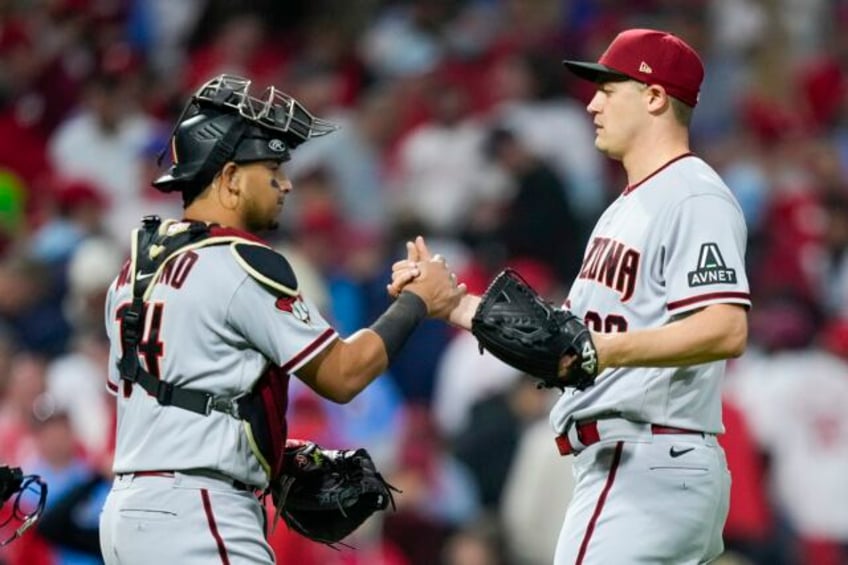 pham gurriel homer diamondbacks power past phillies 5 1 to force nlcs game 7