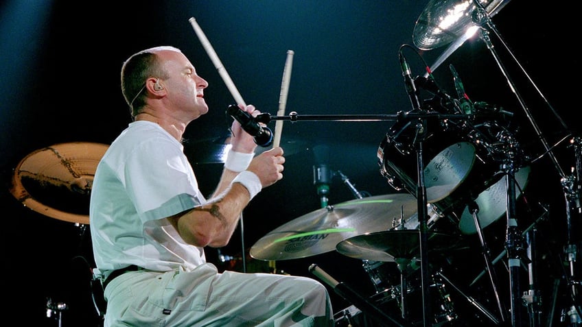 Phil Collins playing the drums