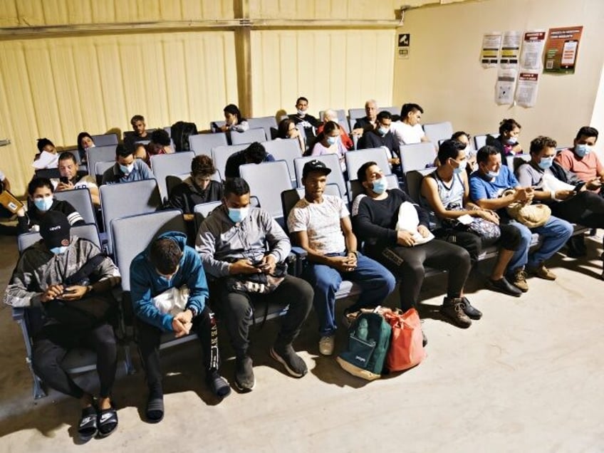 Migrants at an NGO assistance facility in Eagle Pass, Texas, US, on Monday, May 23, 2022. A Louisiana federal judge blocked the Biden administration on Friday from ending Title 42, a pandemic-related border restriction that allows for the immediate expulsion of asylum-seekers and other migrants. Photographer: Eric Thayer/Bloomberg