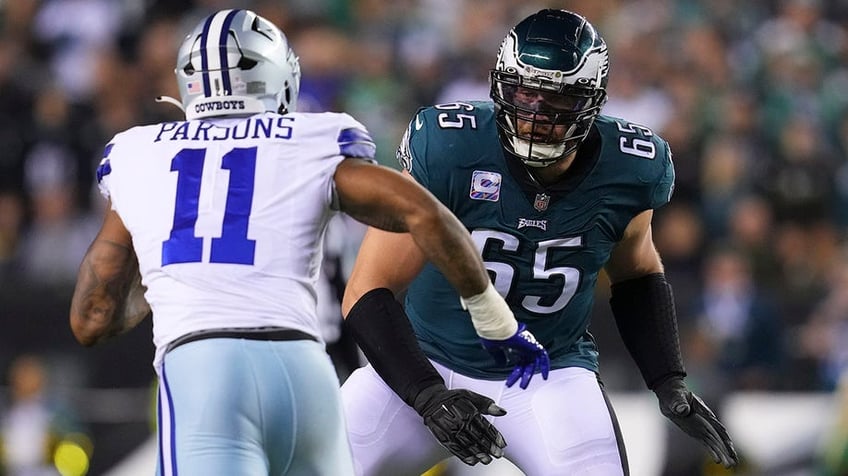 Lane Johnson blocks during a game