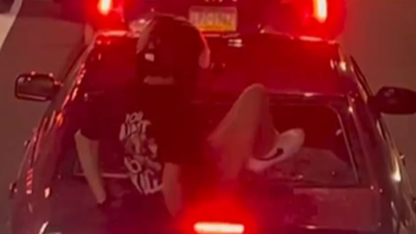 philadelphia motorcyclist arrested after kicking in womans car windshield during road rage assault cops say