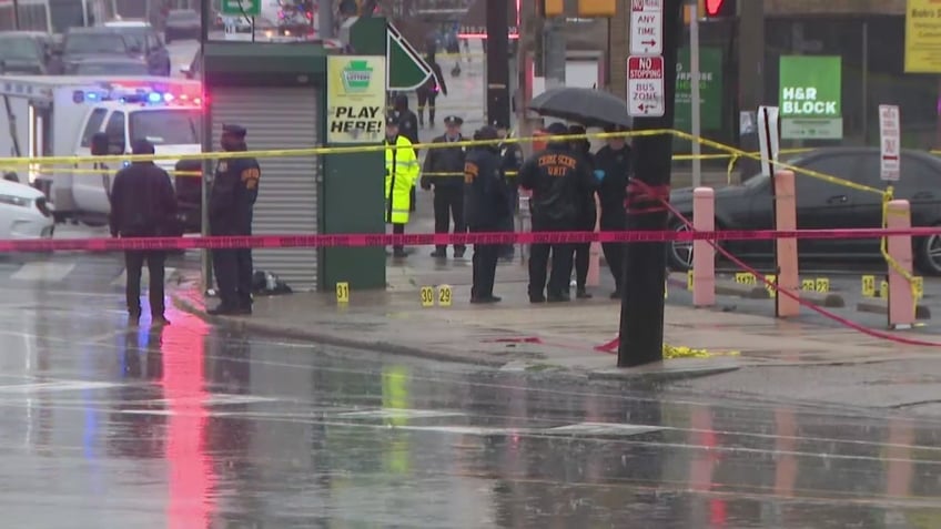 philadelphia police continue piecing together bus stop shooting that injured 8 students