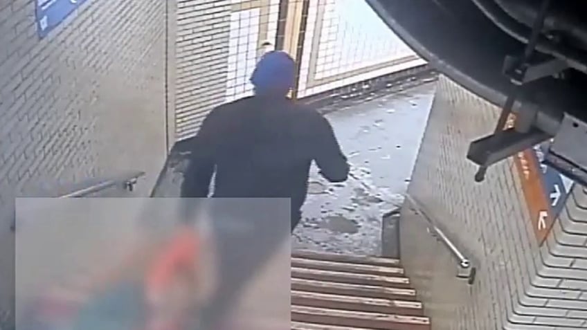 philadelphia surveillance video shows man dragged down septa stairs in violent attack suspect at large