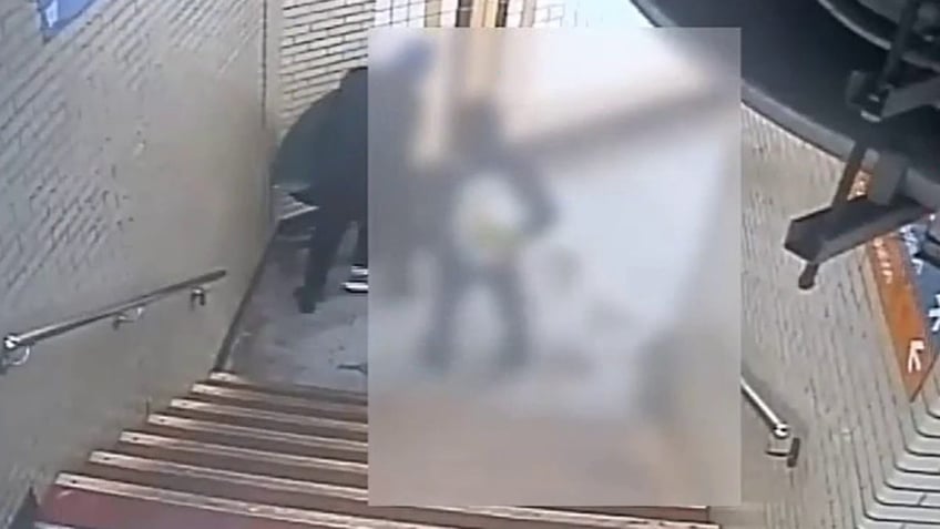 philadelphia surveillance video shows man dragged down septa stairs in violent attack suspect at large