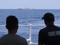 Philippine civilian boat convoy turns back from sail to China-held reef