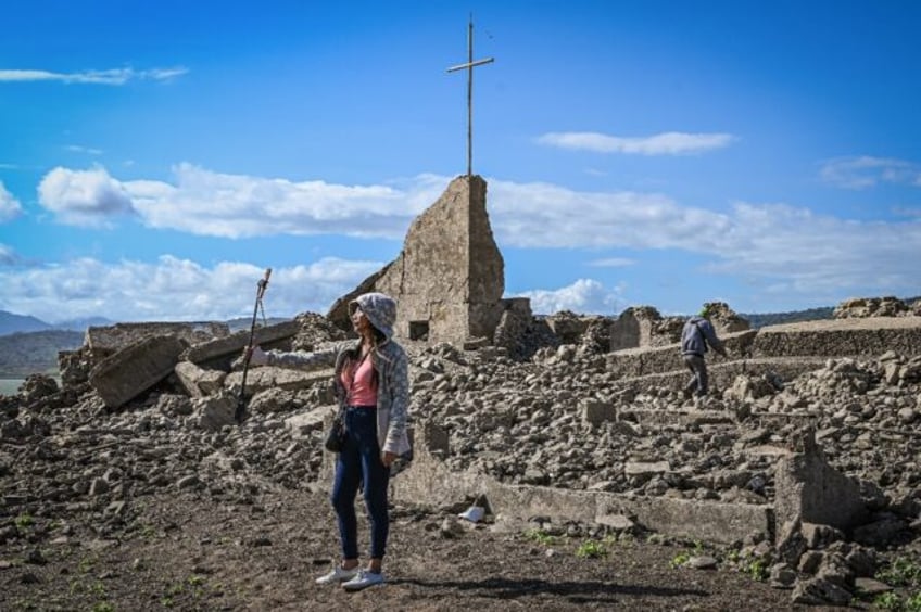 The ruins in the middle of Pantabangan Dam in Nueva Ecija province are a tourist draw