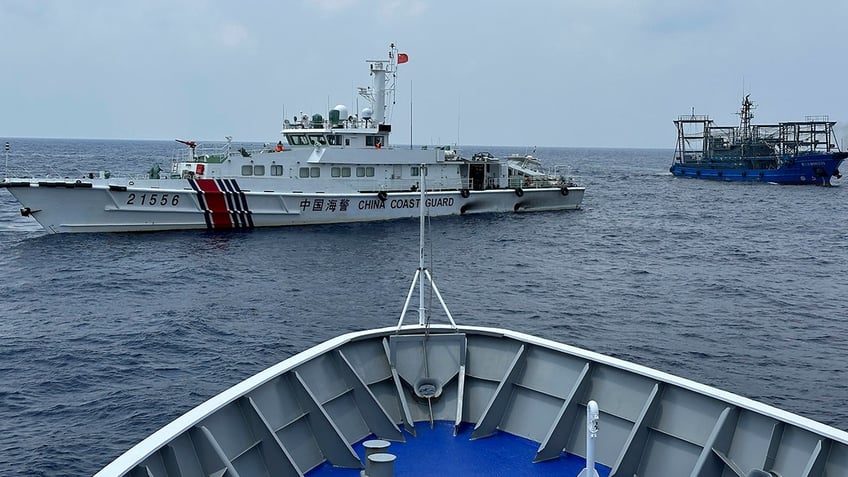 philippines furious after chinese coast guard ship comes within 3 feet of colliding with philippine vessel