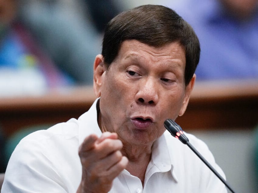 Former Philippine President Rodrigo Duterte speaks during a senate investigation on the wa