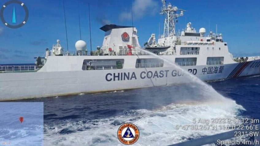 philippines summons chinese ambassador over water cannon incident in disputed sea official says