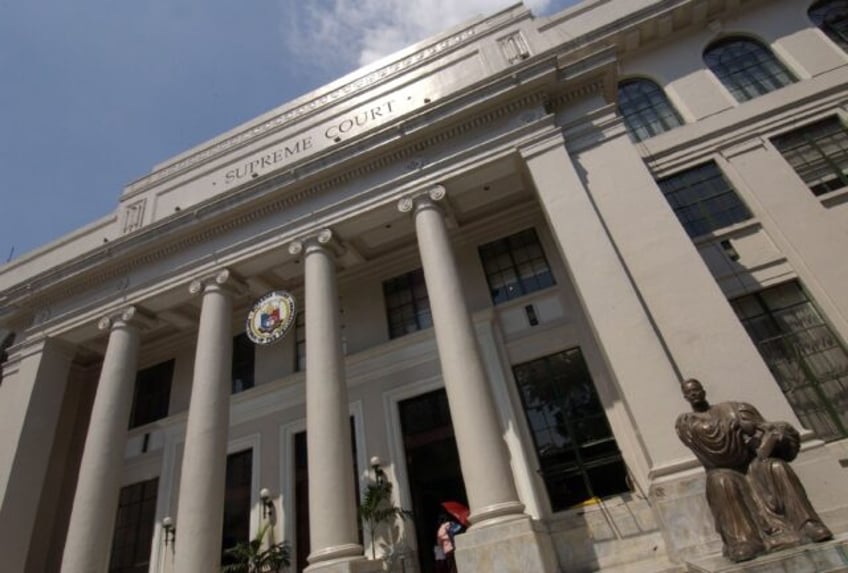 philippines top court orders re arrest of suspect in activist killing