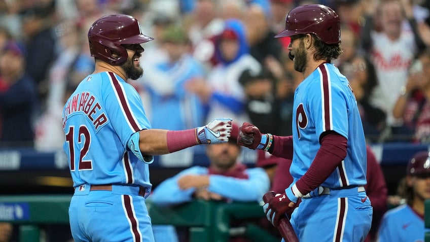 phillies bryce harper throws batting helmet into stands after ejection