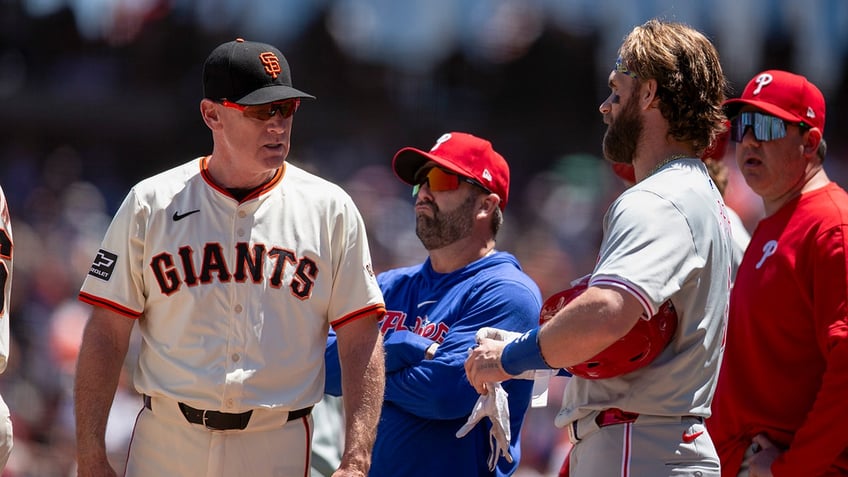 Coach checks on Bryce Harper