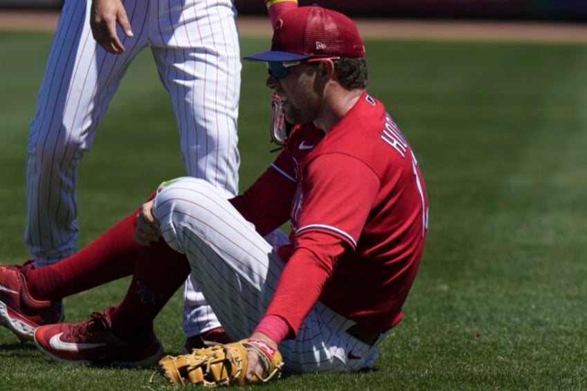 phillies injured first baseman rhys hoskins remains a long shot to make postseason roster