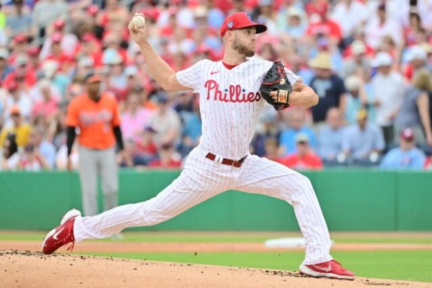 Philadelphia's Zack Wheeler will have to wait until Friday to throw his team's MLB season