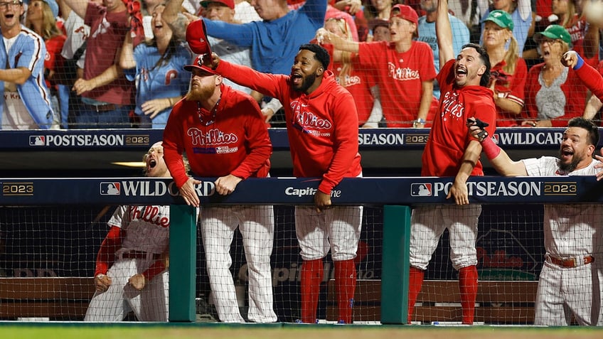 phillies rout marlins behind jt realmuto bryson stott homers to win wild card series