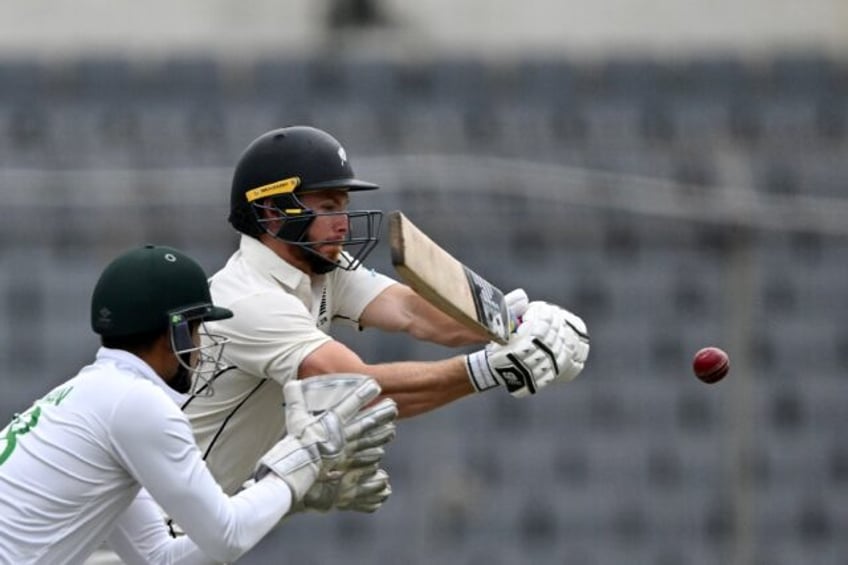 phillips rescues new zealand to leave test finely poised