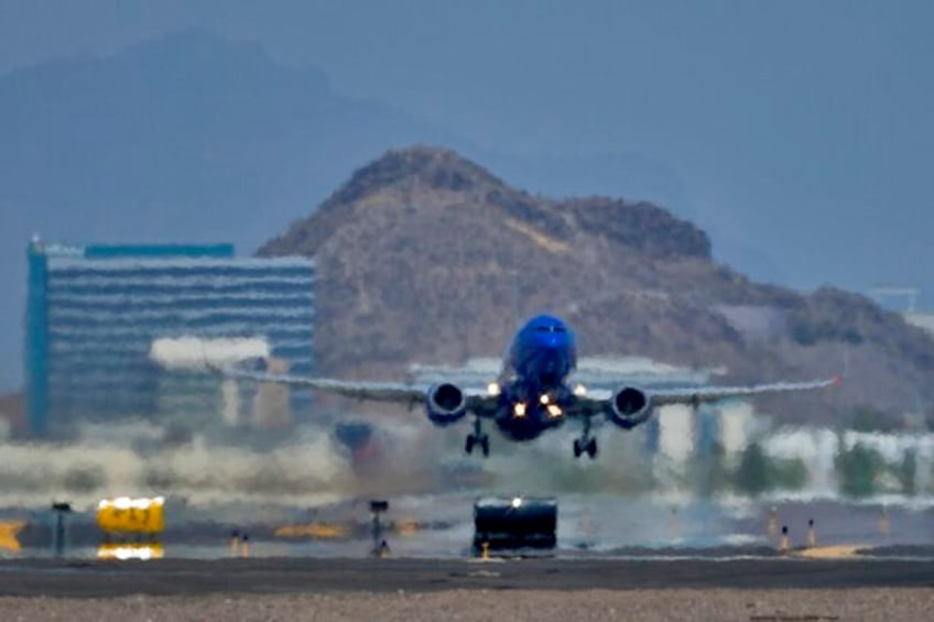 phoenix on track to set another heat record this time for most daily highs at or above 110 degrees