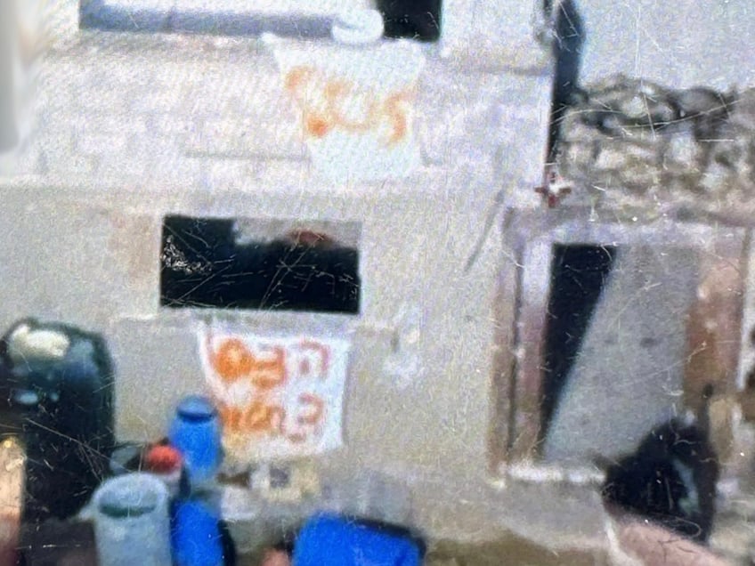 photo heroic israeli hostages made sos banner calling for help in gaza