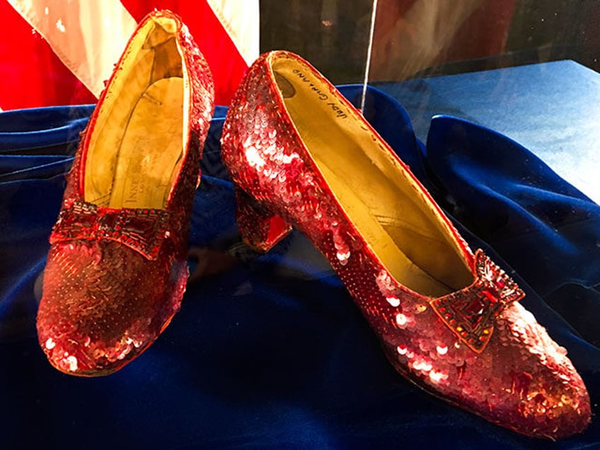 Ruby slippers once worn by Judy Garland in the "The Wizard of Oz," are displayed at a news