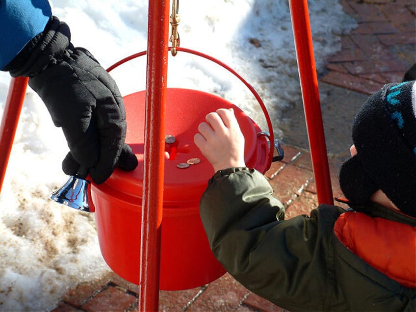 photo mystery donor drops gold coin worth 1200 into chicago area salvation army kettle