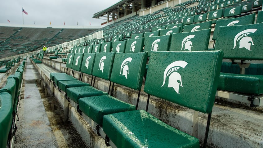 photo of hitler appears on michigan state jumbotron before game