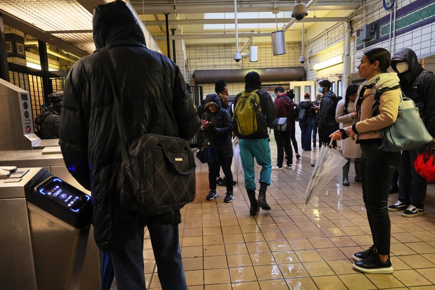 photos heavy rains bring flash floods to new york city roads and subways paralyzed as state of emergency declared