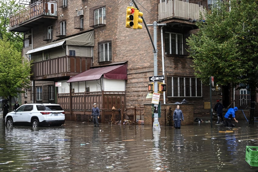 photos heavy rains bring flash floods to new york city roads and subways paralyzed as state of emergency declared