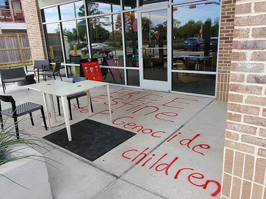 photos houston area starbucks hit with anti israel graffiti stop killing children