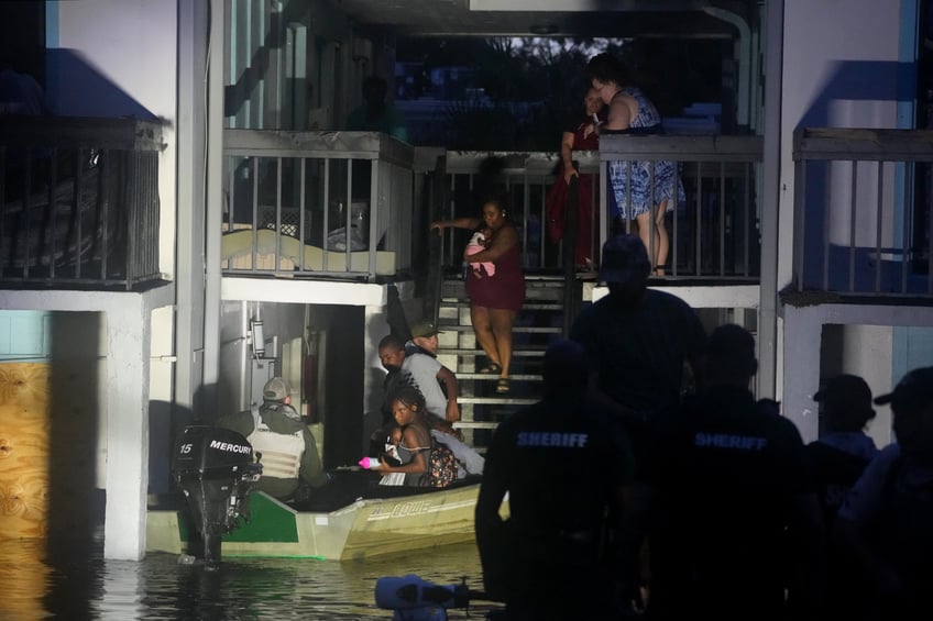 photos hurricane milton tornadoes tear a path of destruction through florida killing 4