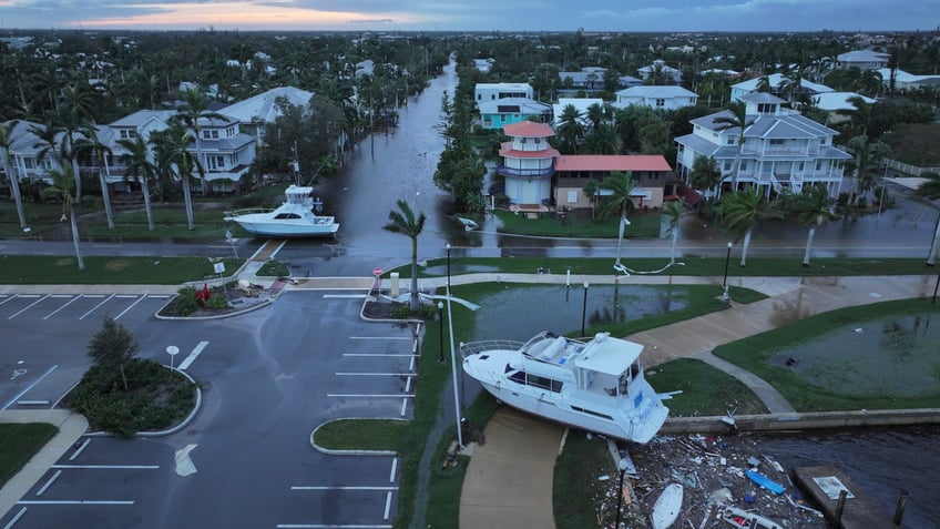 photos hurricane milton tornadoes tear a path of destruction through florida killing 4