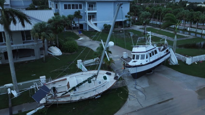 photos hurricane milton tornadoes tear a path of destruction through florida killing 4