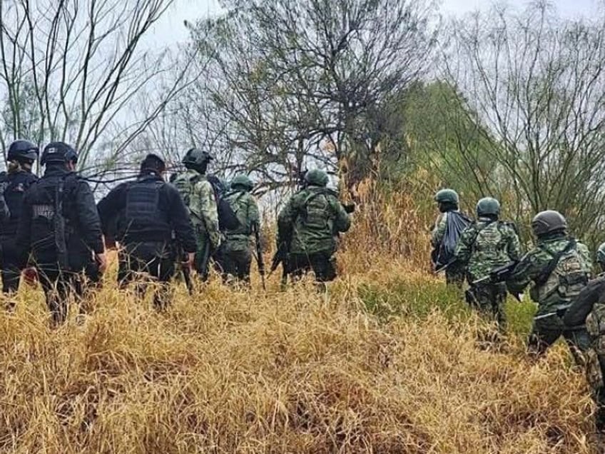 Mexican State Police officers search an island for cartel gunmen who fired on U.S. Border Patrol agents. (PHOTO: Cartel Chronicles/Breitbart Texas)