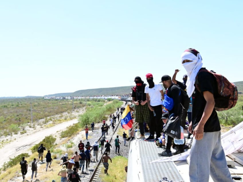 photos migrants using trains to reach mexican border city