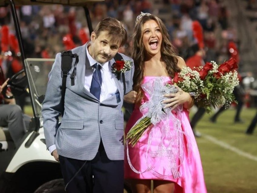 photos my god is the miracle worker al dad battling cancer walks daughter to be crowned homecoming queen