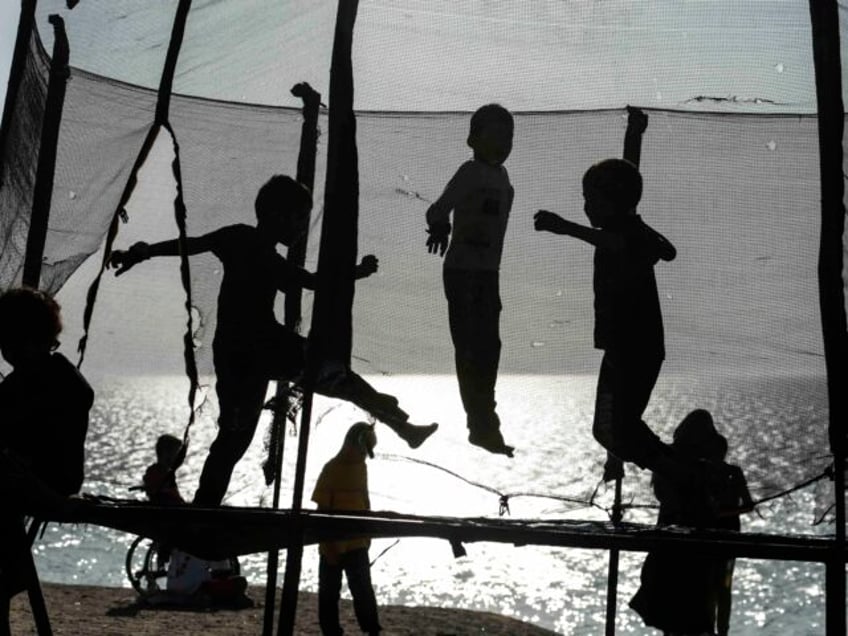 photos palestinians hit the beach in gaza