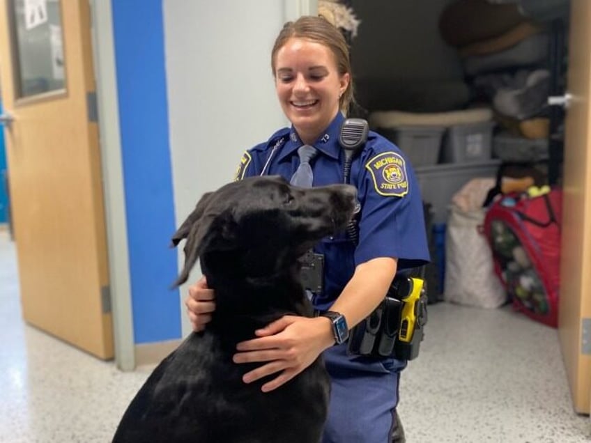 photos perfect match michigan trooper gives abandoned dog forever home
