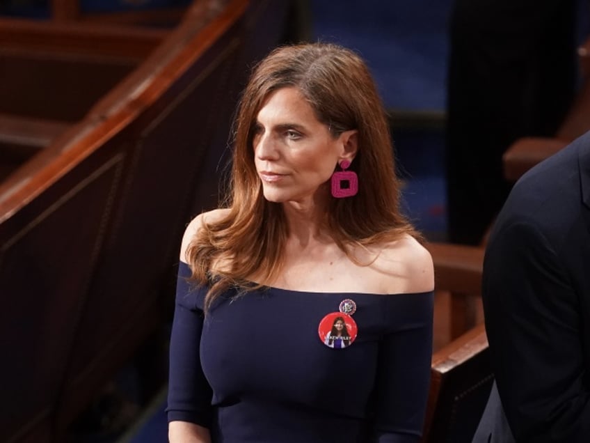 photos republicans wear pins honoring laken riley at joe bidens state of the union