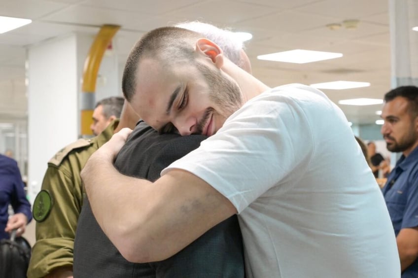 photos rescued israeli hostages reunite with families after daring raid