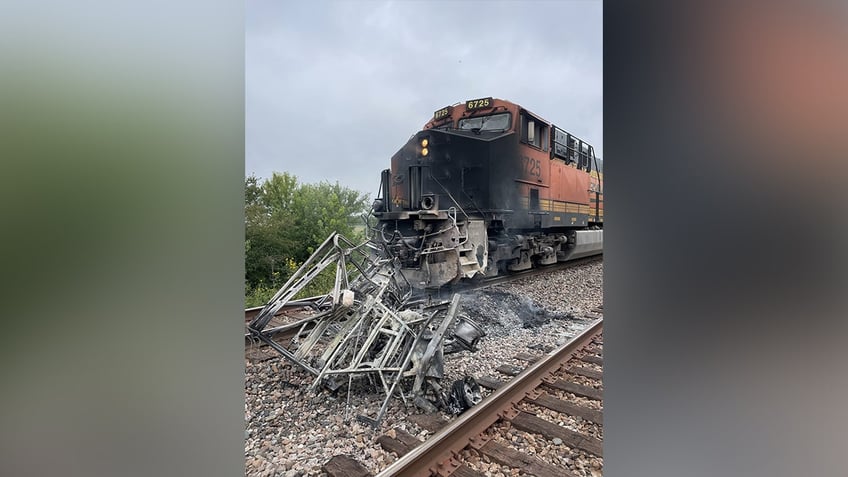 photos show mangled metal mess after freight train crashes into atv