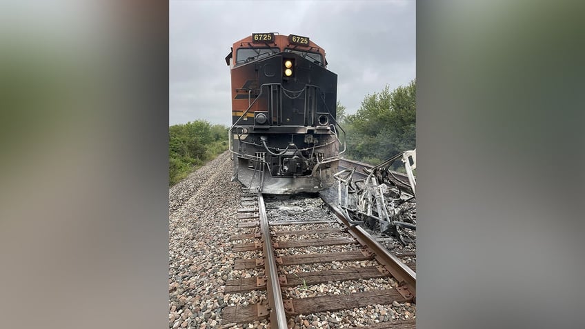 photos show mangled metal mess after freight train crashes into atv