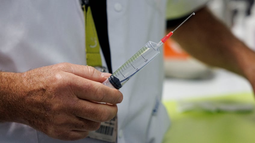 A doctor prepares a syringe with "Thiopental" a barbiturate that is used in the practice of euthanasia in a hospital in Belgium, on February 1