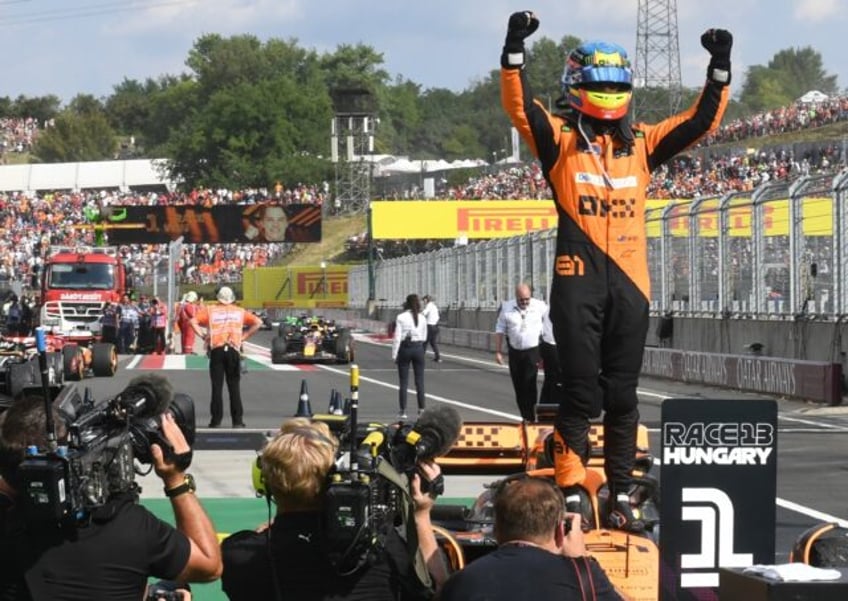 First win: Oscar Piastri celebrates