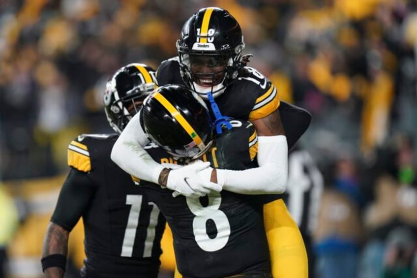 pickett hits johnson for late touchdown as the steelers slip past levis titans 20 16