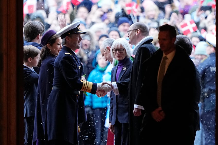 King Frederik X and Queen Mary of Denmark are greeted as they arrive for a church service on the occasion of the change of throne in Denmark, inside Aarhus Cathedral, Aarhus, Denmark on January 21, 2024. Its the first public appearance in Jutland by Denmark's new King and Queen since the change of throne one week ago. (Photo by Bo Amstrup / Ritzau Scanpix / AFP) / Denmark OUT (Photo by BO AMSTRUP/Ritzau Scanpix/AFP via Getty Images)