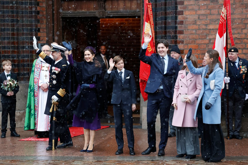 King Frederik X (L) and Queen Mary of Denmark wave to onlookers as they arrive with their children Crown Prince Christian (3rdR), Princess Isabella (R), Princess Josephine and Prince Vincent for a church service on the occasion of the change of throne in Denmark, in front of Aarhus Cathedral, Aarhus, Denmark on January 21, 2024. Its the first public appearance in Jutland by Denmark's new King and Queen since the change of throne one week ago. (Photo by Mikkel Berg Pedersen / Ritzau Scanpix / AFP) / Denmark OUT (Photo by MIKKEL BERG PEDERSEN/Ritzau Scanpix/AFP via Getty Images)