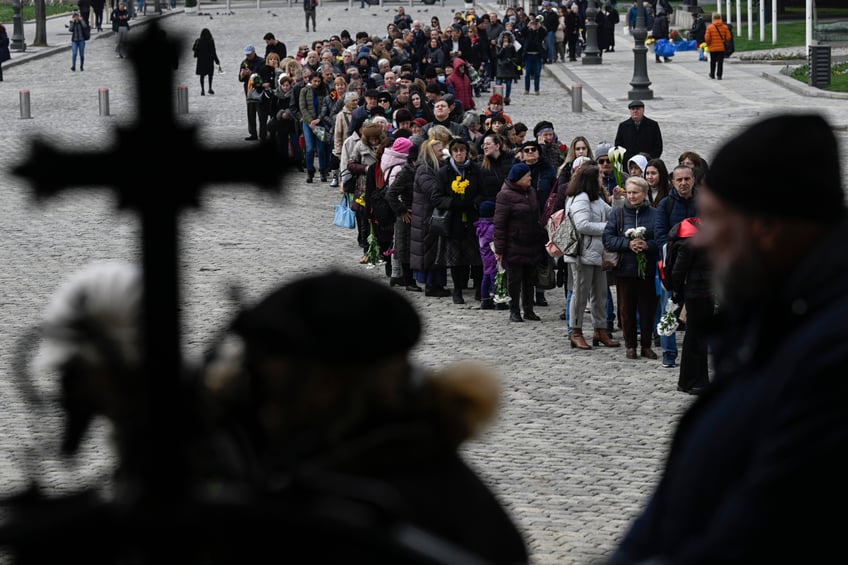 Attendees wait in a queue to pay their respects to late Patriarch Neophyte of Bulgaria's Orthodox Church, during a funeral service at the golden-domed "Alexander Nevski" cathedral in Sofia on March 15, 2024. Bulgaria bid its last farewell to its Christian Orthodox religious leader Patriarch Neophyte, who died on March 13 at the age of 78. (Photo by Nikolay DOYCHINOV / AFP) (Photo by NIKOLAY DOYCHINOV/AFP via Getty Images)