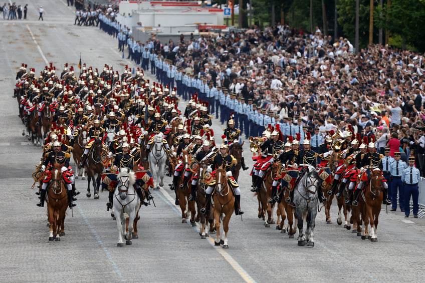 Cavalry Regiment of the French Republican Guard march past during the Bastille Day military parade along the Avenue Foch in Paris on July 14, 2024. (Photo by Ludovic MARIN / AFP) (Photo by LUDOVIC MARIN/AFP via Getty Images)